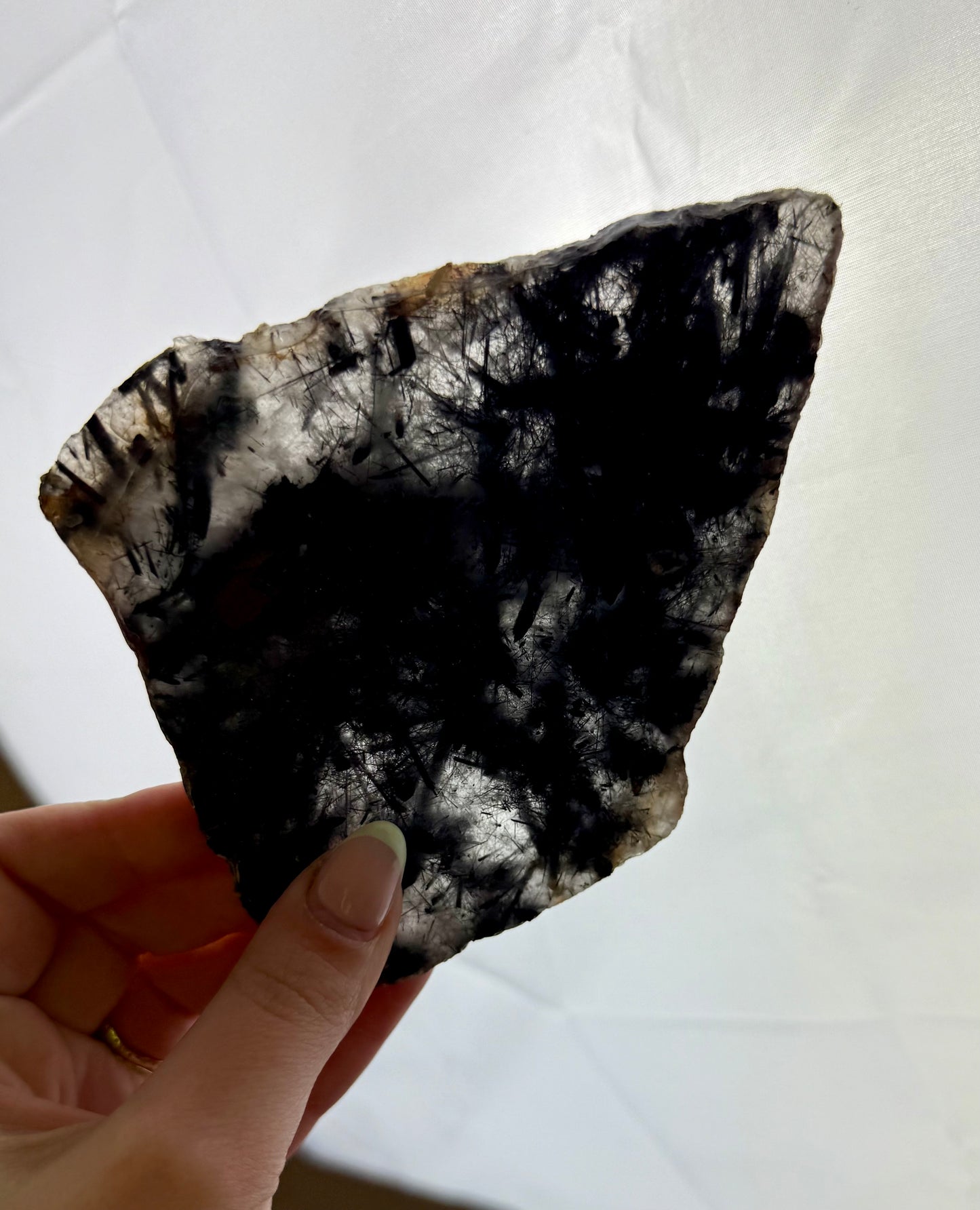 Black tourmaline in quartz slab