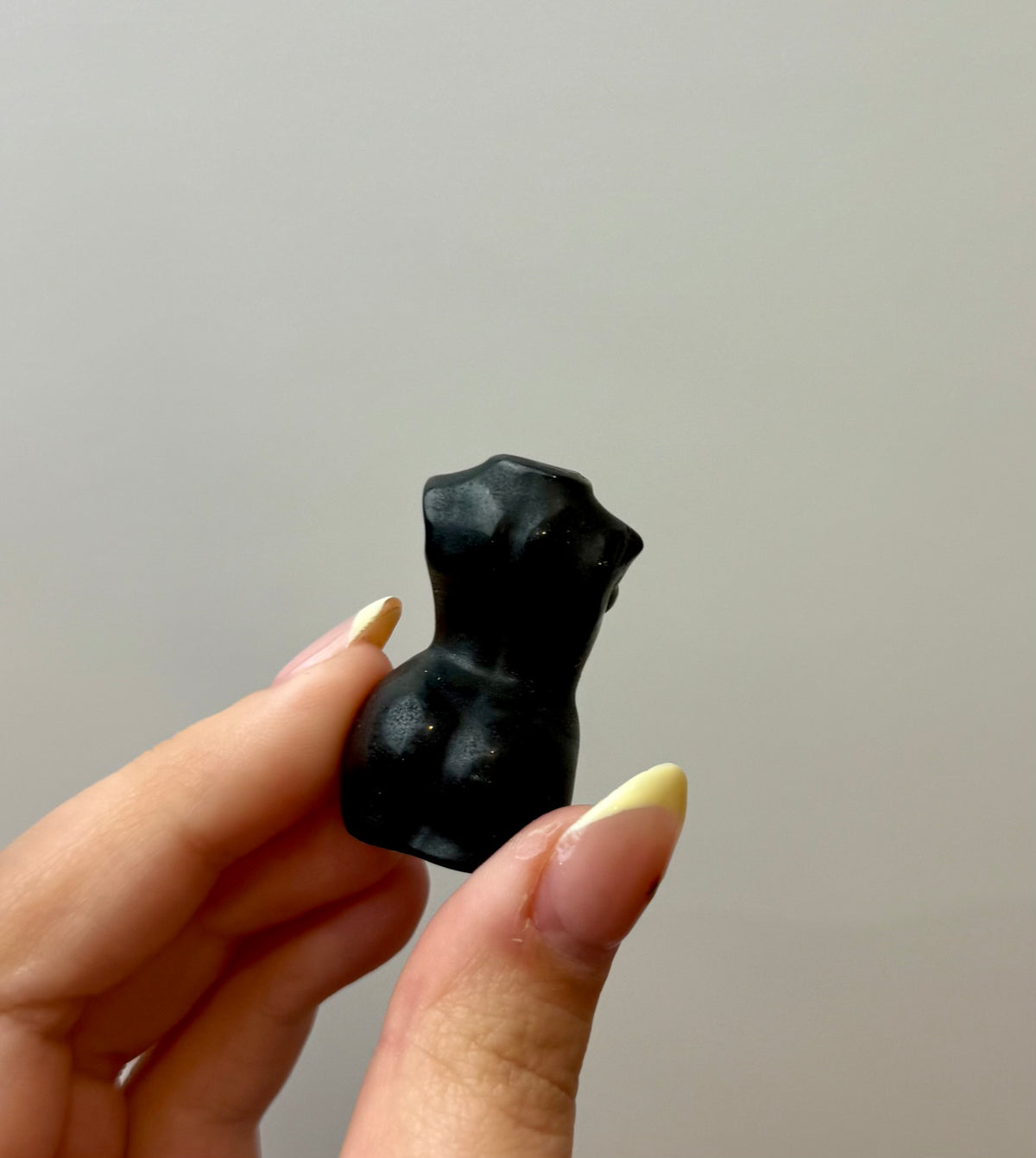 Obsidian woman body carving