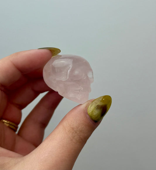 Rose quartz skull carving