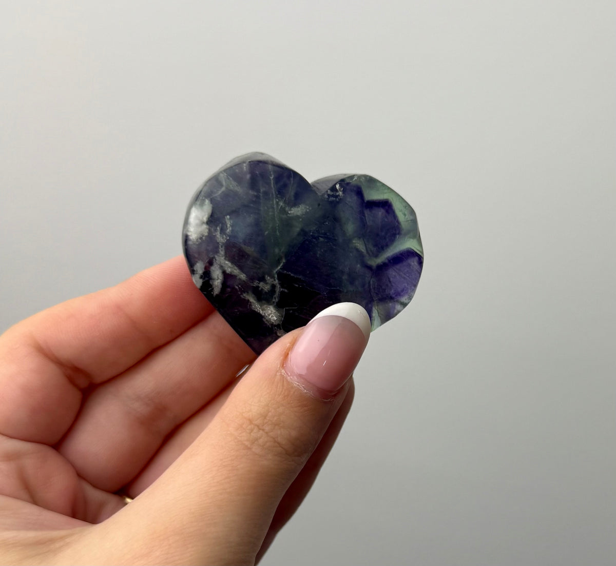 Feather fluorite heart carving