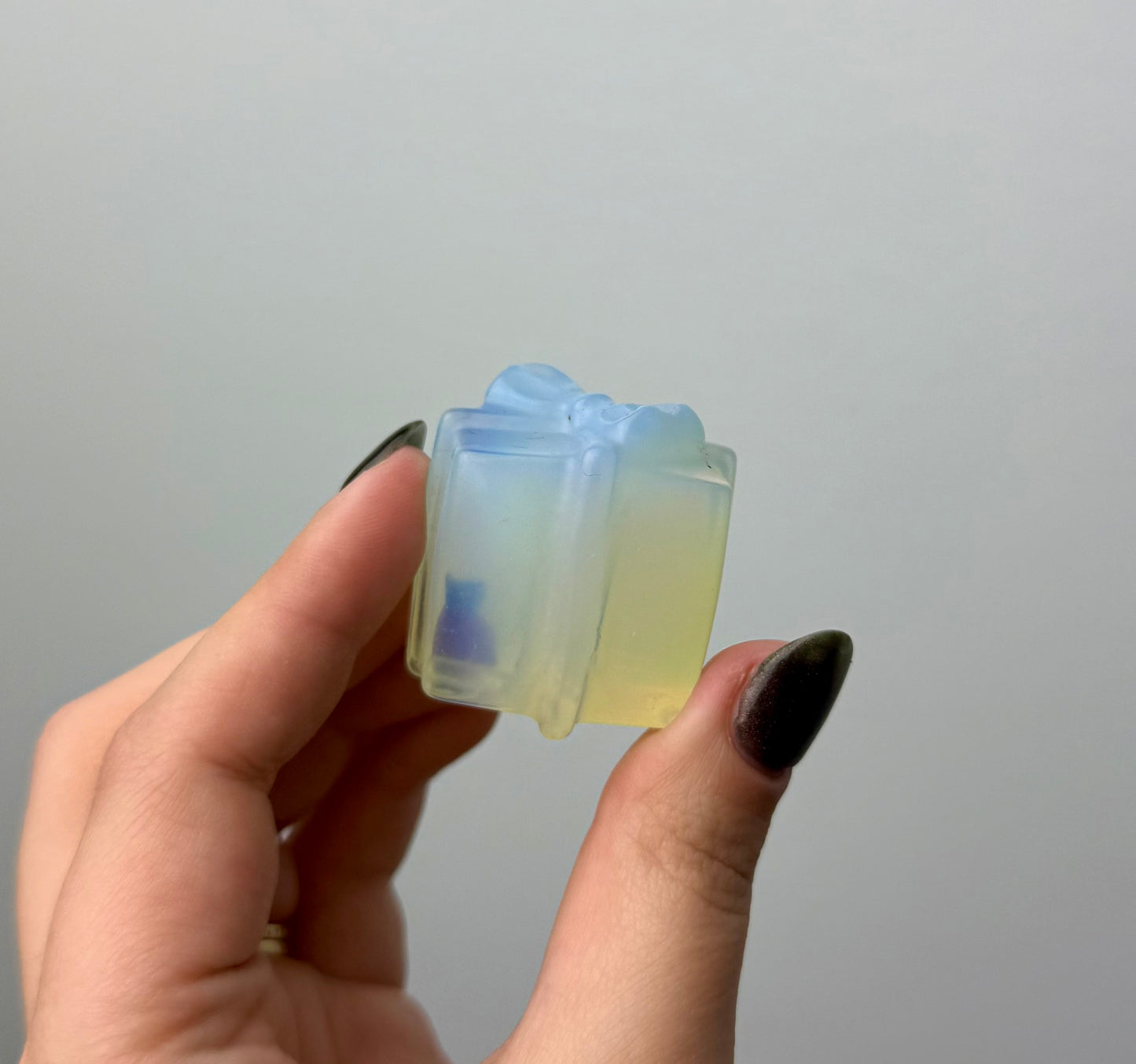 Man made material Opalite present carving