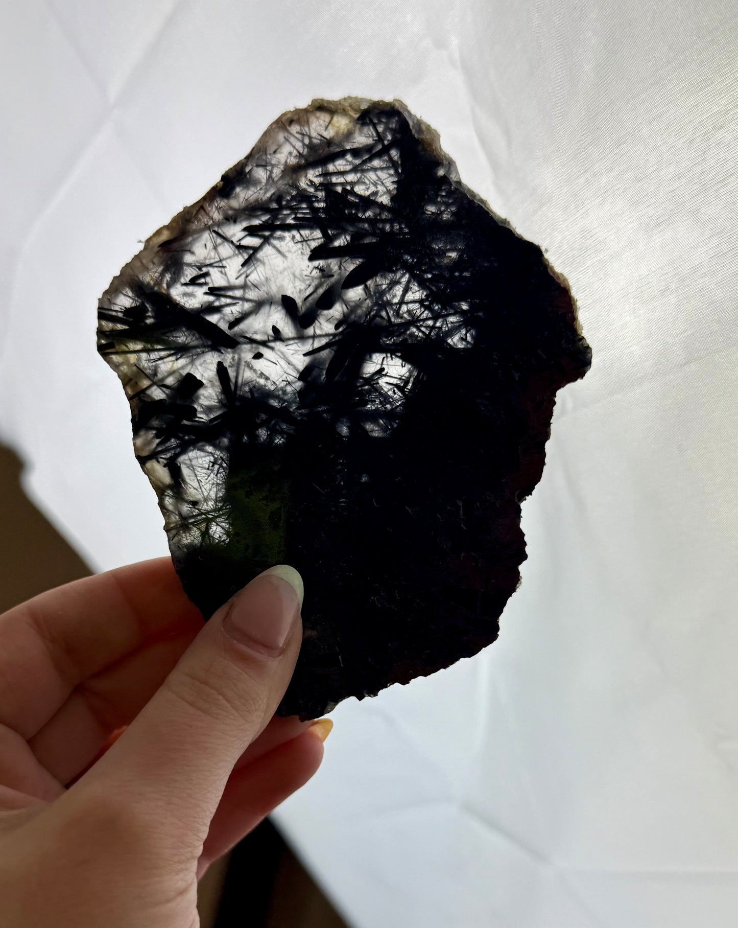 Black tourmaline in quartz slab