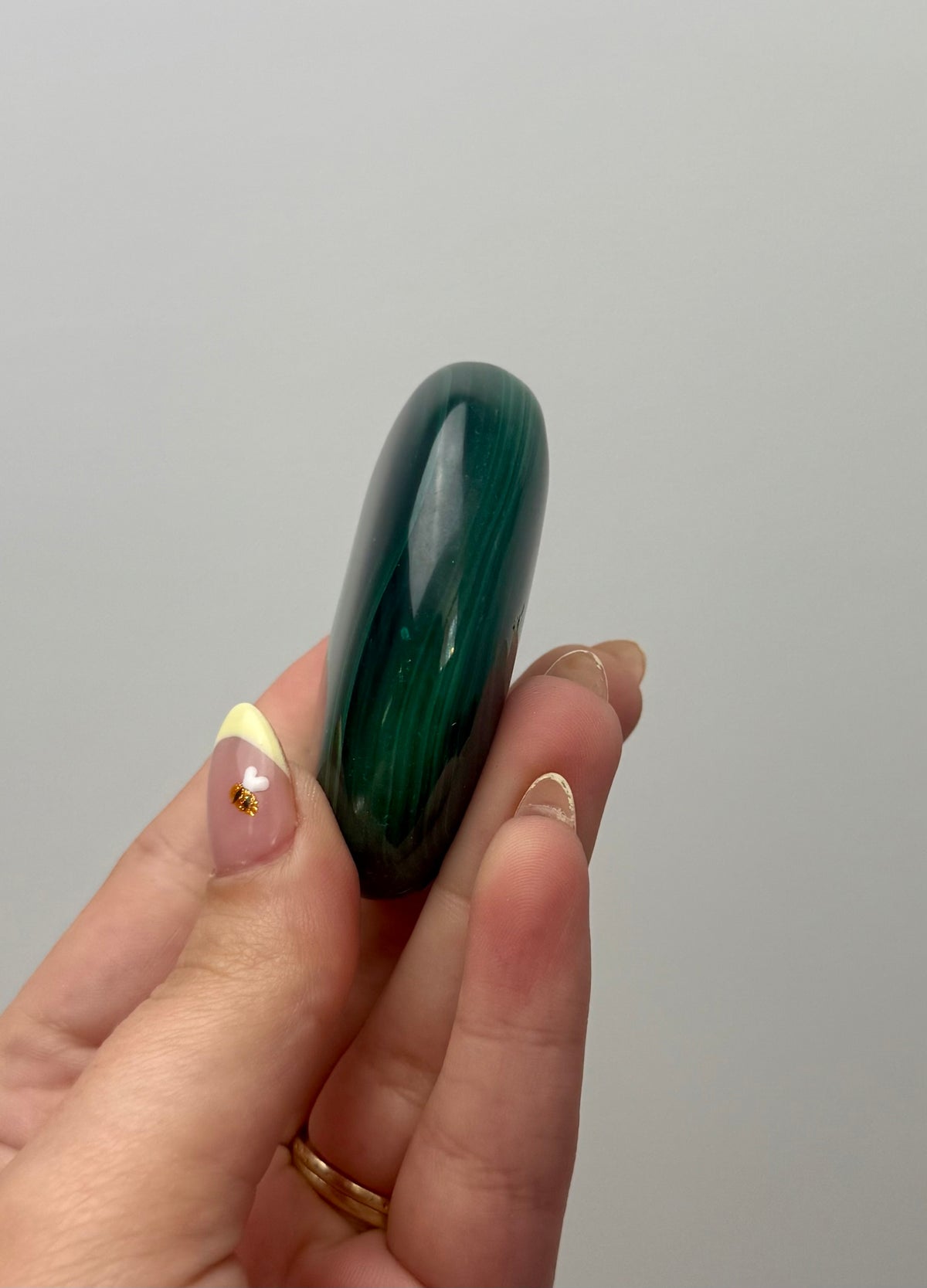 Malachite palm stone A