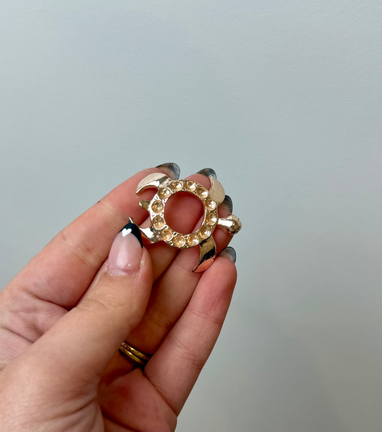 Rose gold turtle sphere stand
