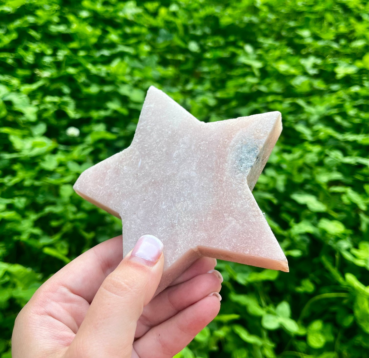 Pink amethyst star carving