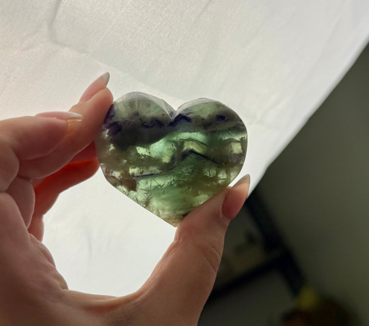 Feather fluorite heart carvings