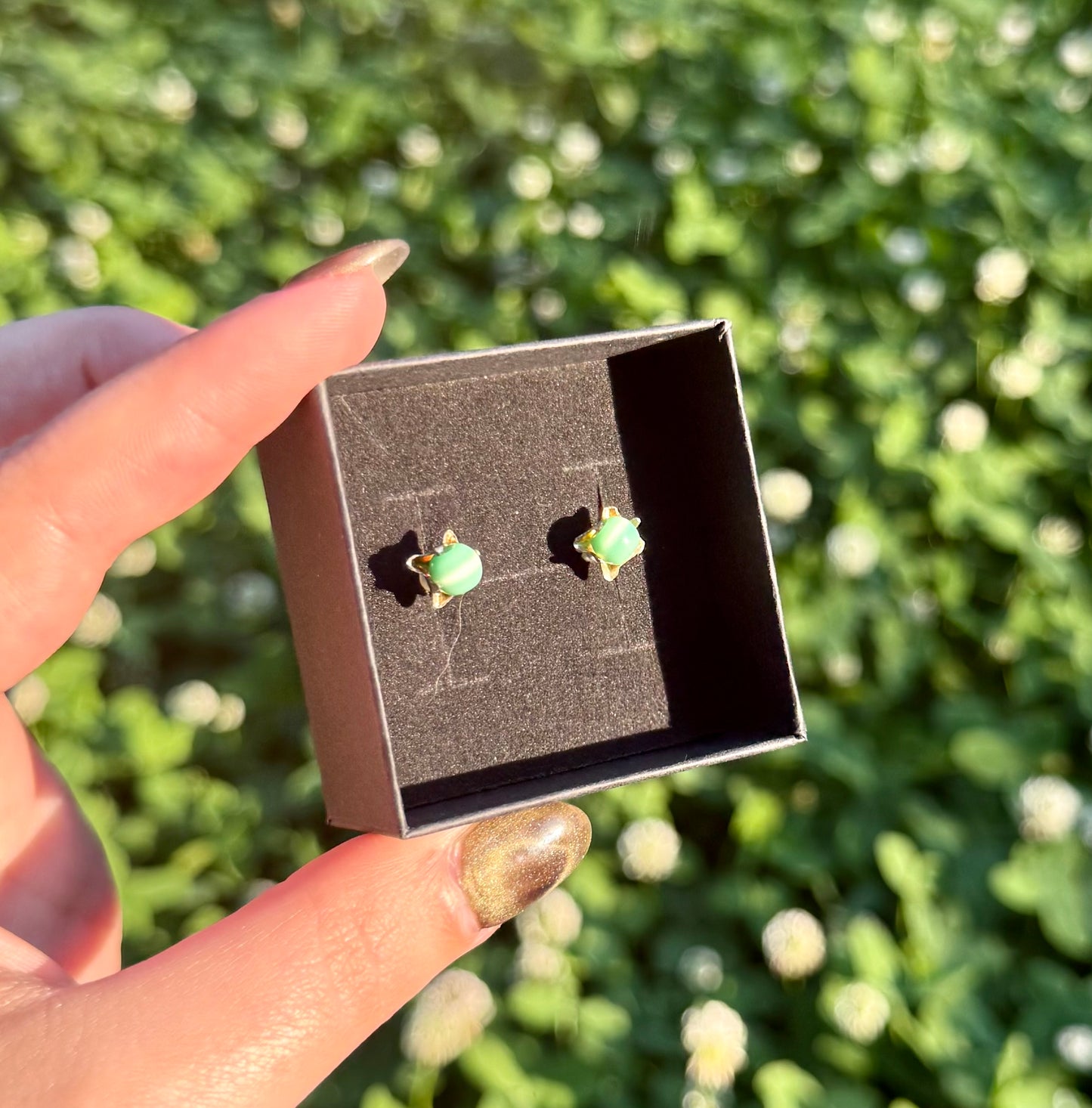 Man made material cats eye earrings thrifted find