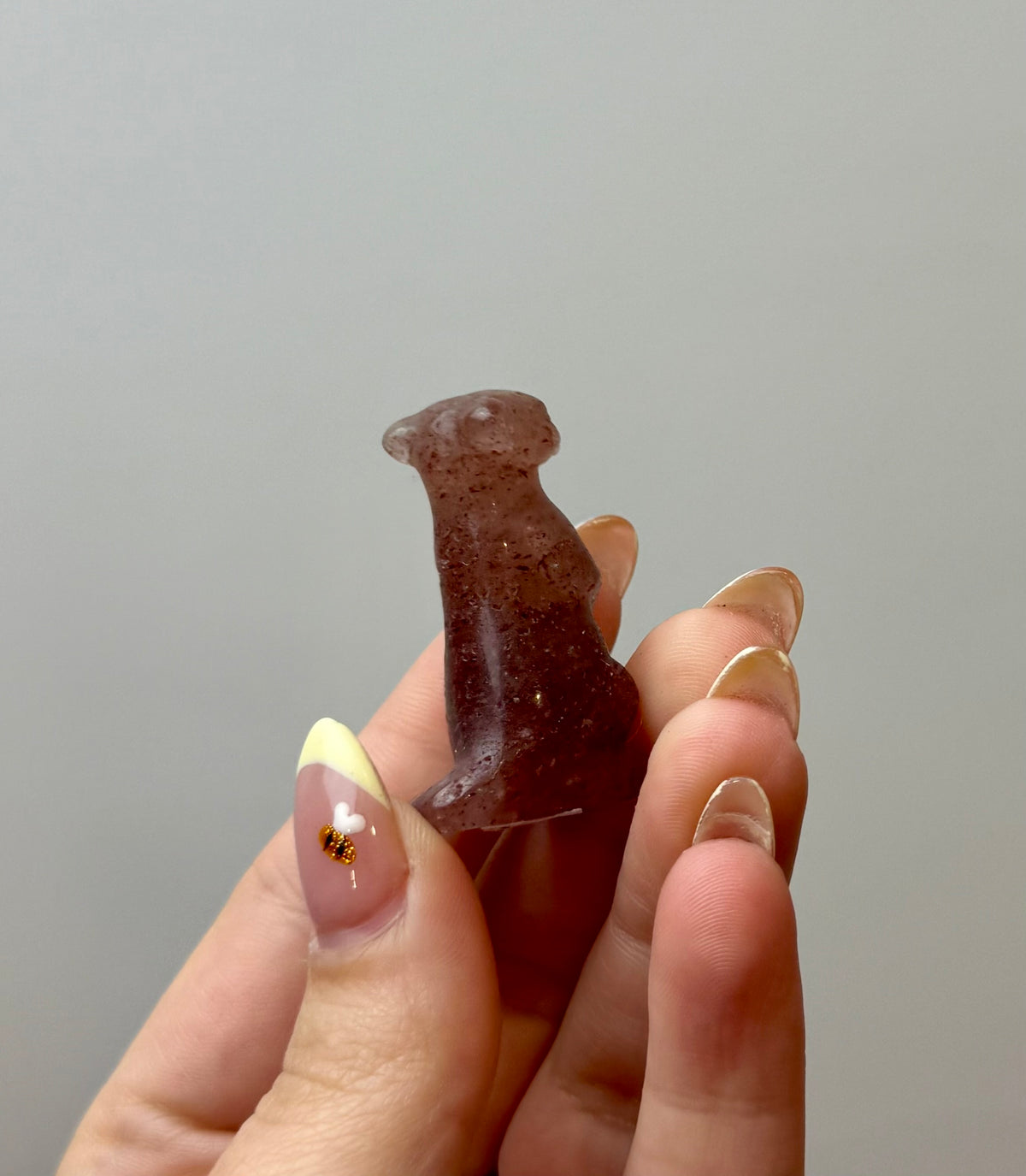 Strawberry quartz meerkat carving