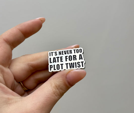 Plot twist enamel pin