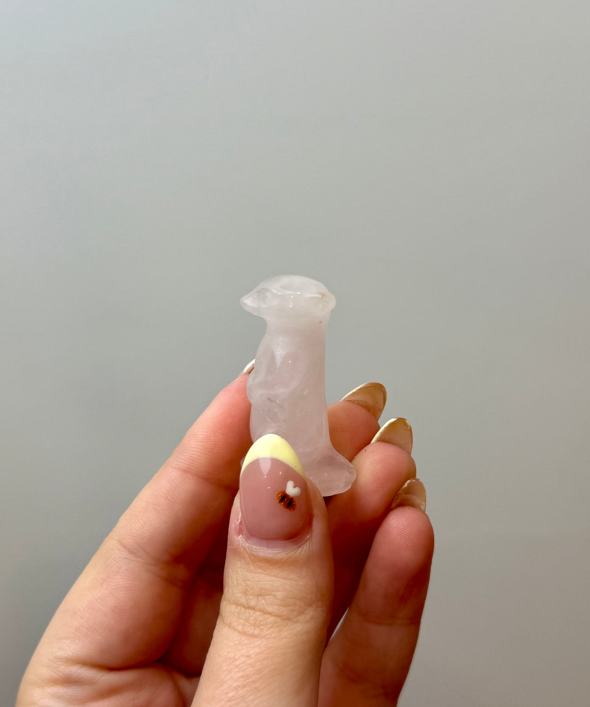 Rose quartz meerkat carving