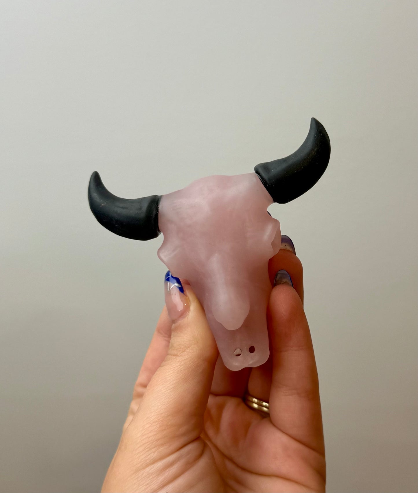 Rose quartz cow skull carving