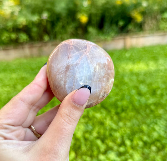 Peach moonstone palm stone