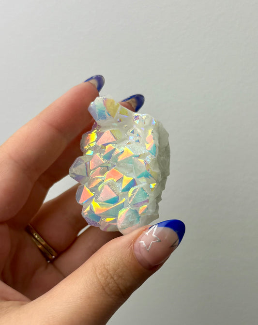 Altered aura quartz cluster