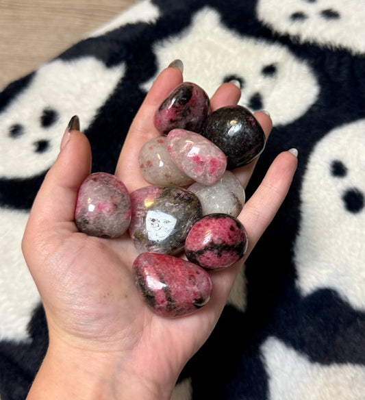 Icy rhodonite tumbles