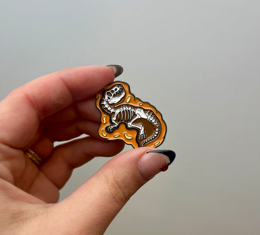 Dinosaur fossil enamel pin