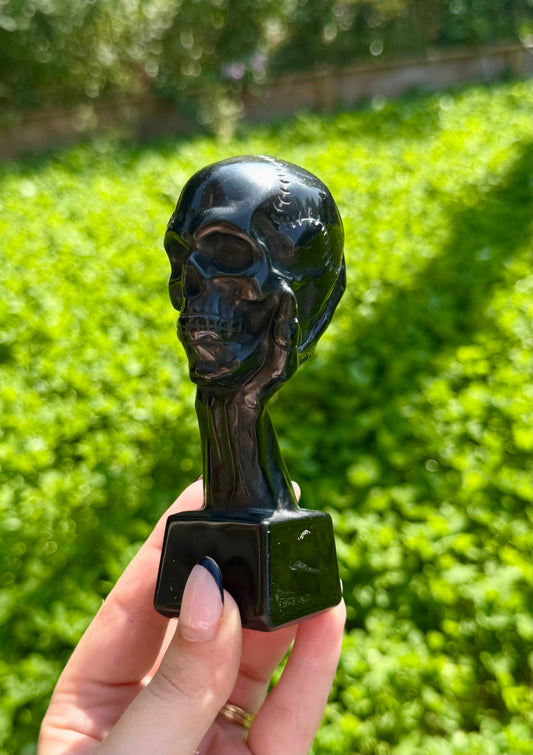 Obsidian skull carvings