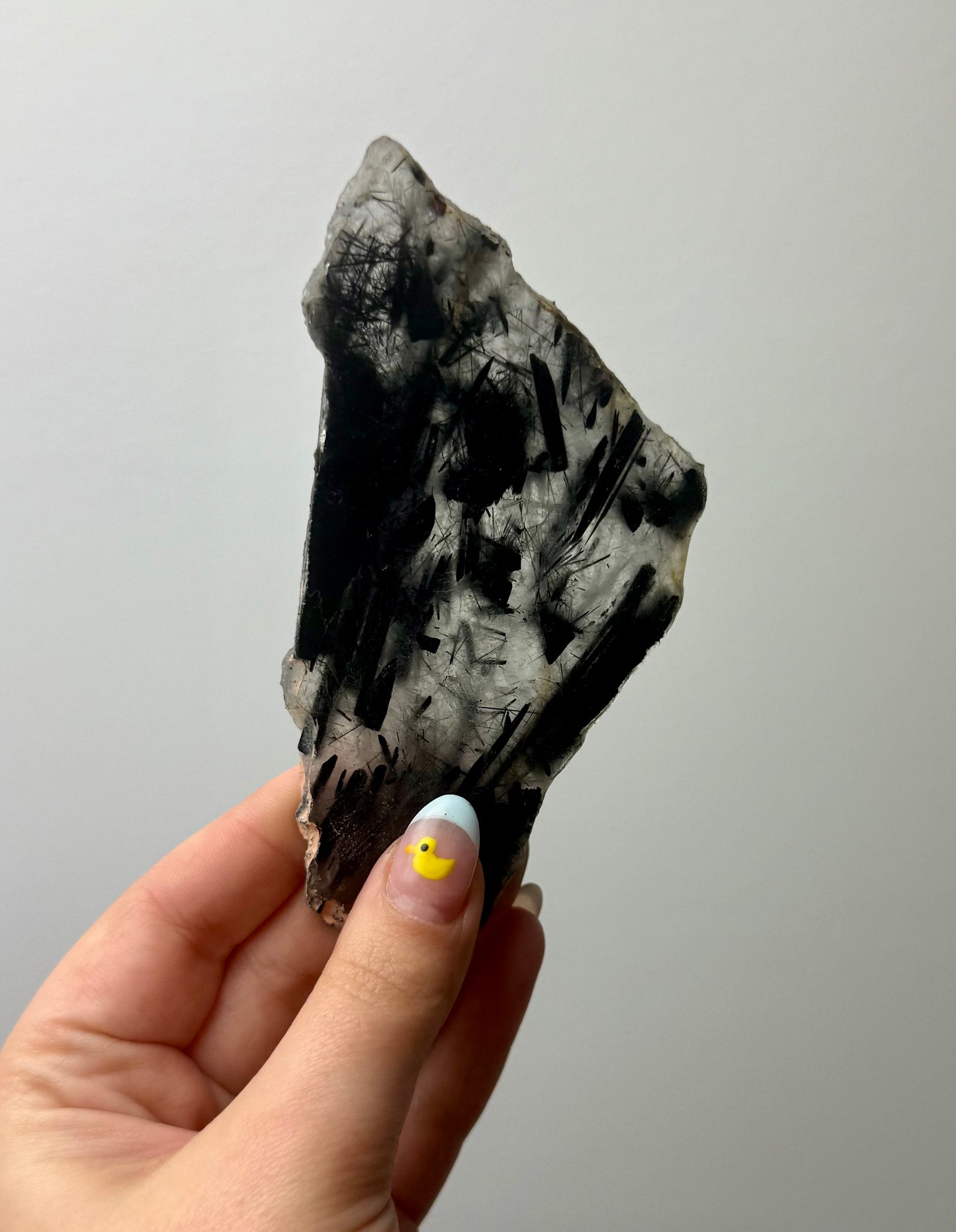 Black tourmaline in quartz slab