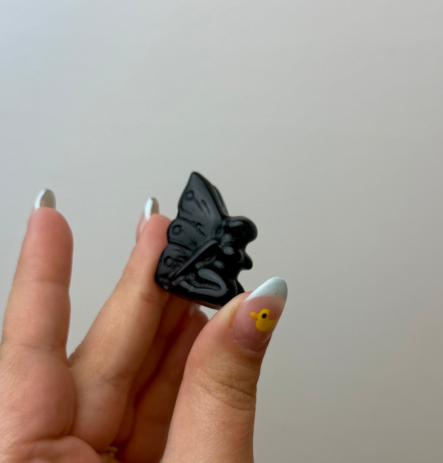 Obsidian fairy carving