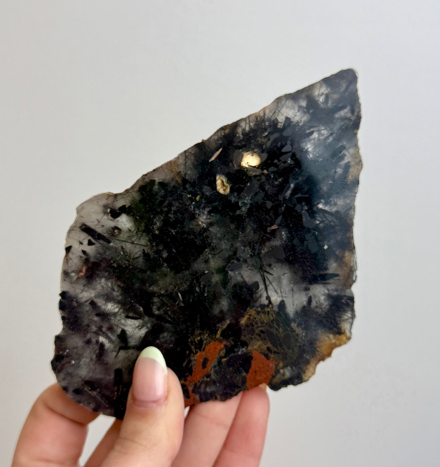 Black tourmaline in quartz slab
