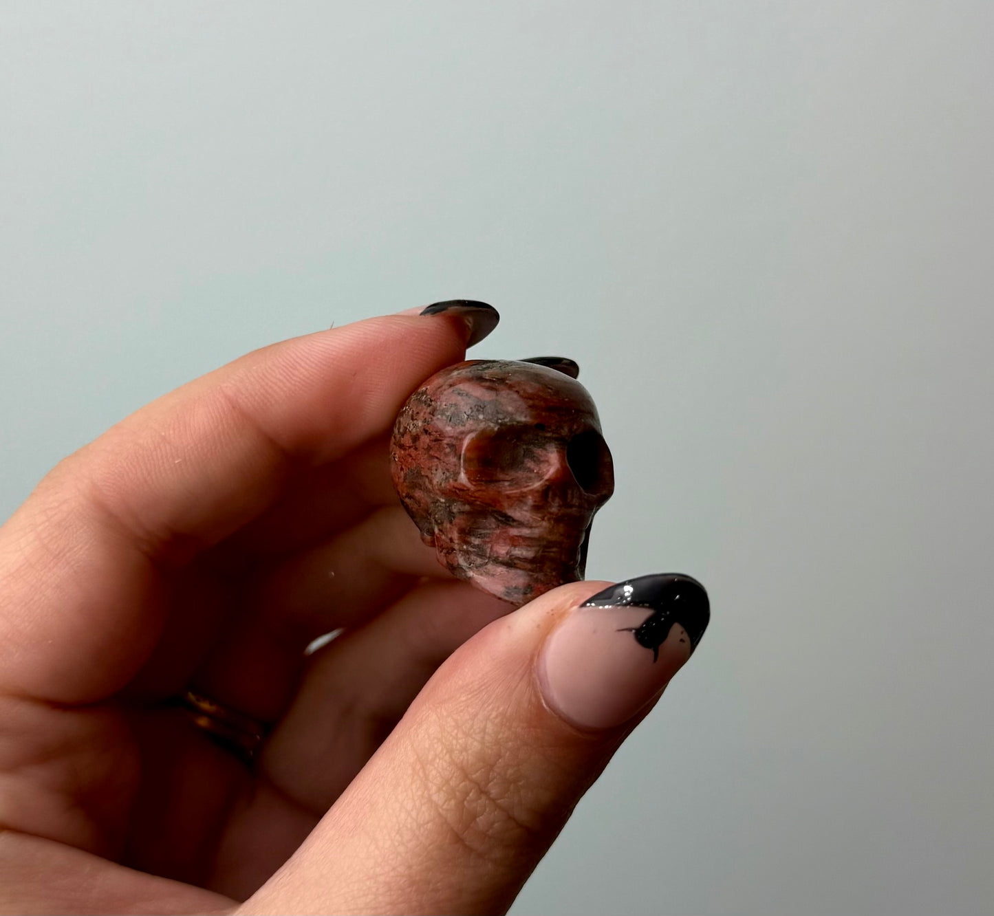 Brecciated jasper skull carving