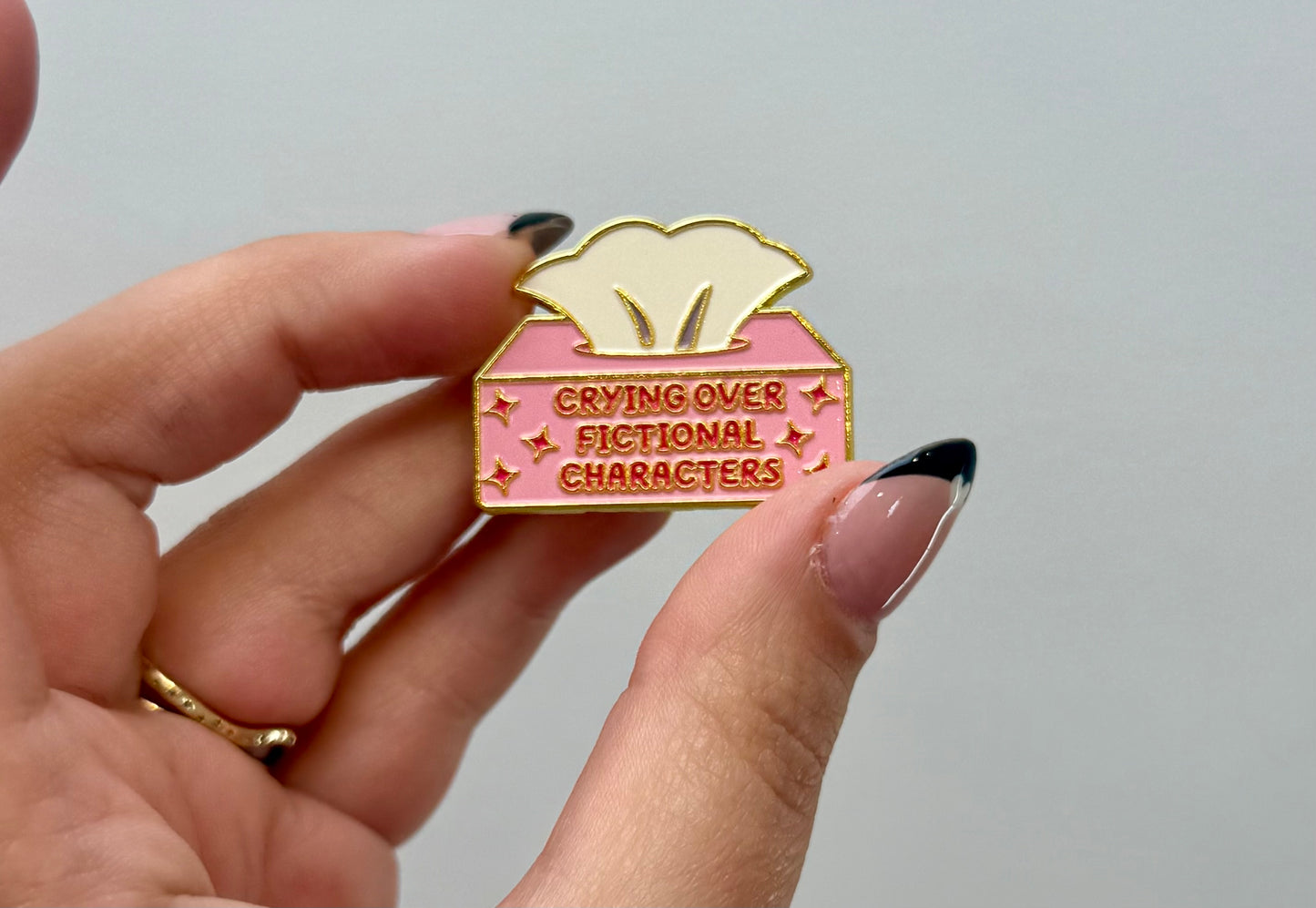 Crying over fictional characters enamel pin