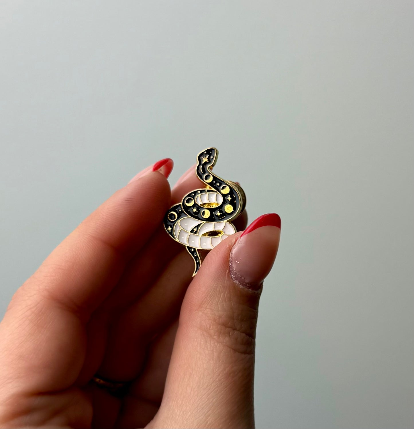 Snake moon phases enamel pin