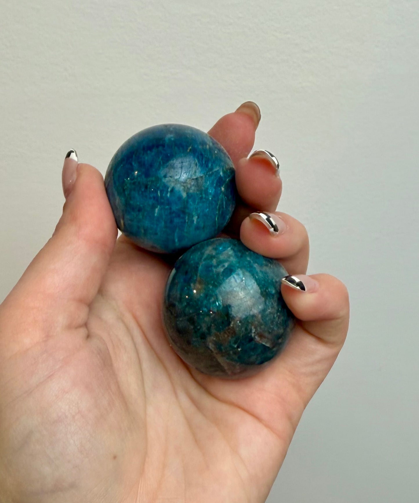 Blue apatite spheres