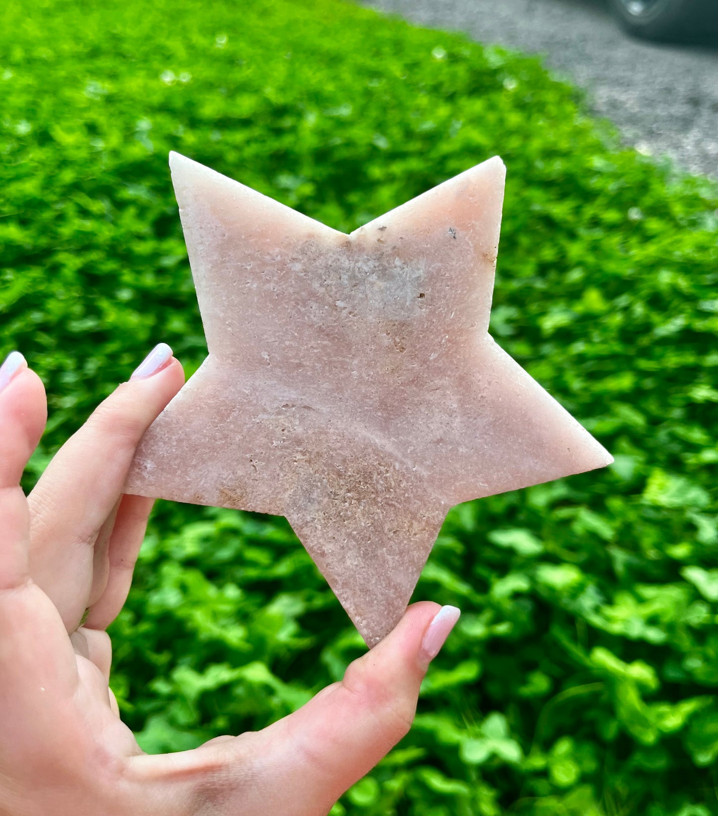 Pink amethyst star carving