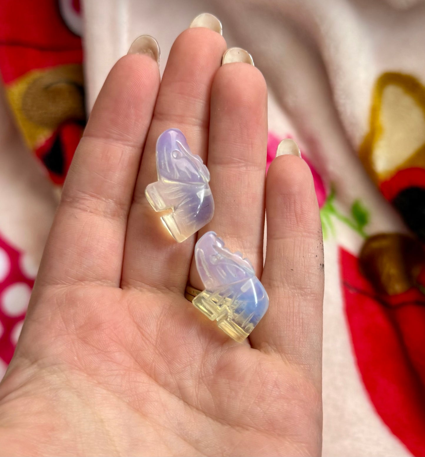Man made material Opalite elephant carvings