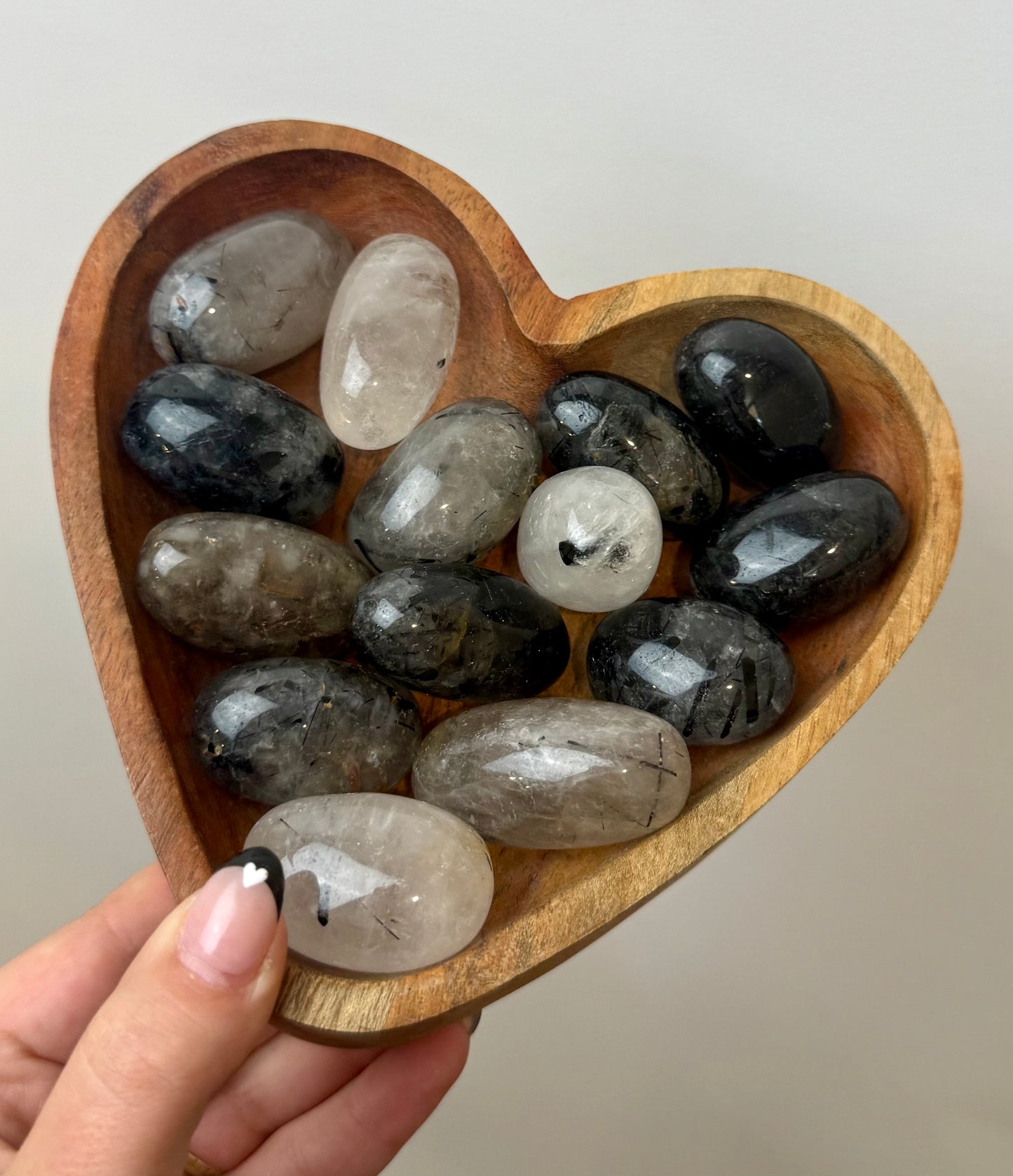 Black tourmaline in quartz tumbles
