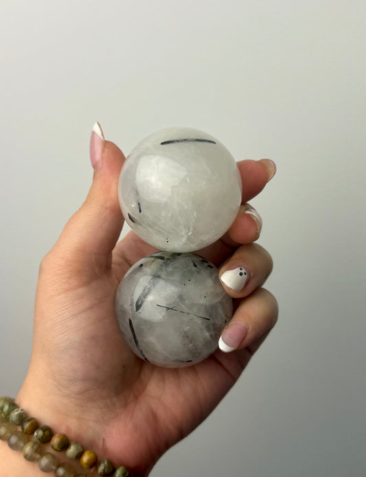 Black tourmaline in quartz spheres