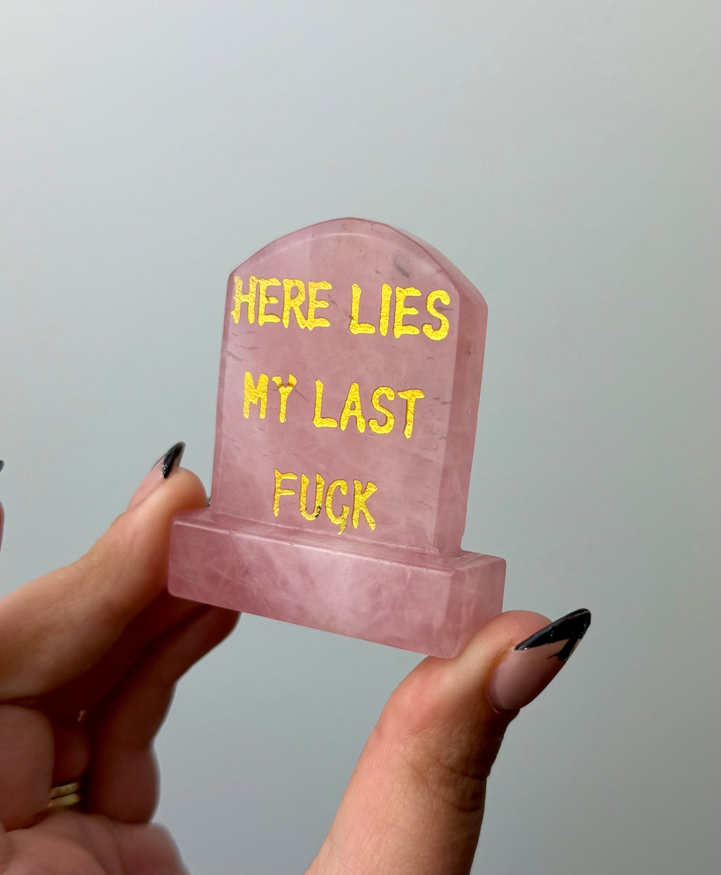 Rose quartz gravestone carving