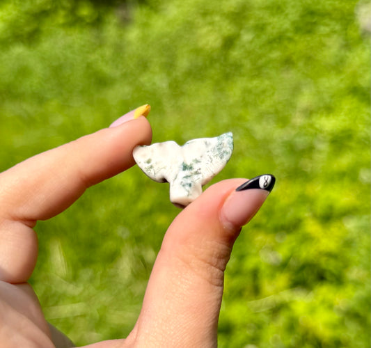 Moss agate whale tail carving