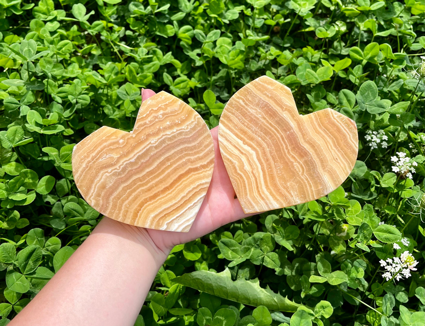 Orange calcite heart carvings