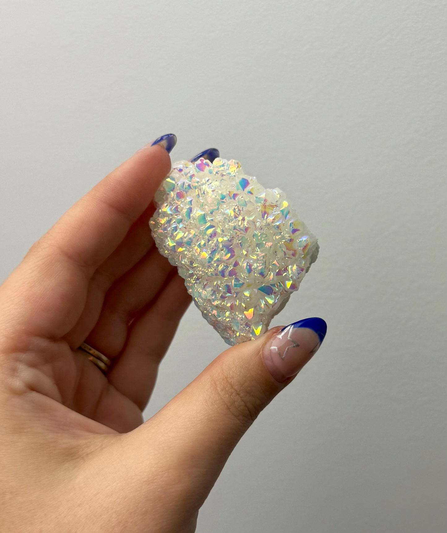 Altered aura quartz cluster