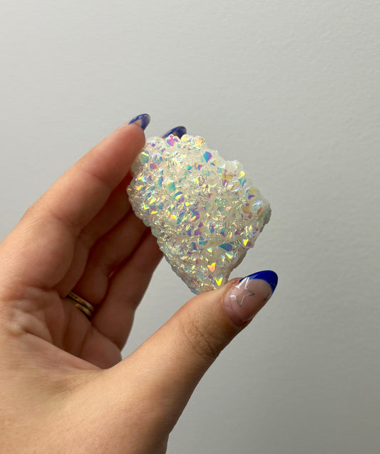Altered aura quartz cluster