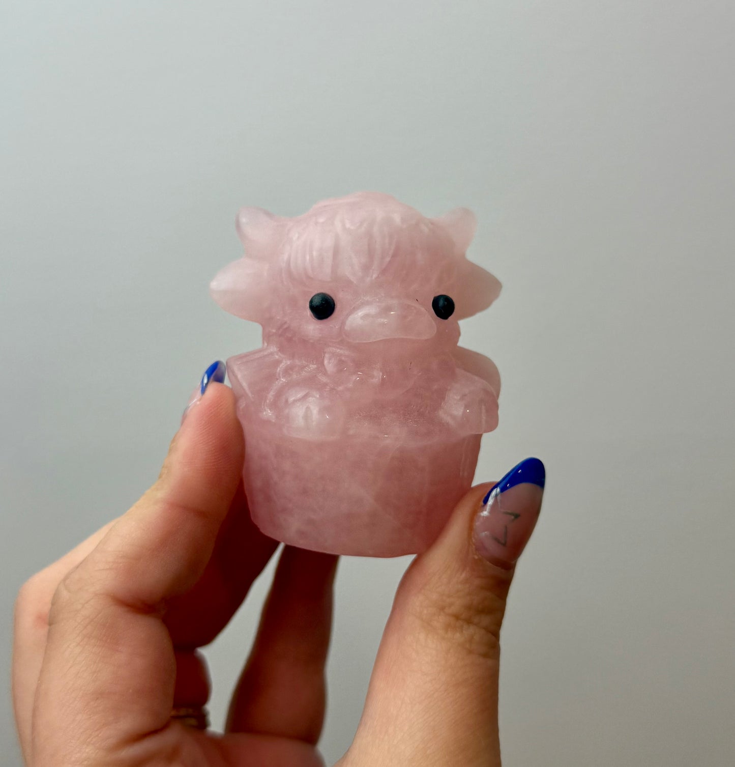Rose quartz cow carving