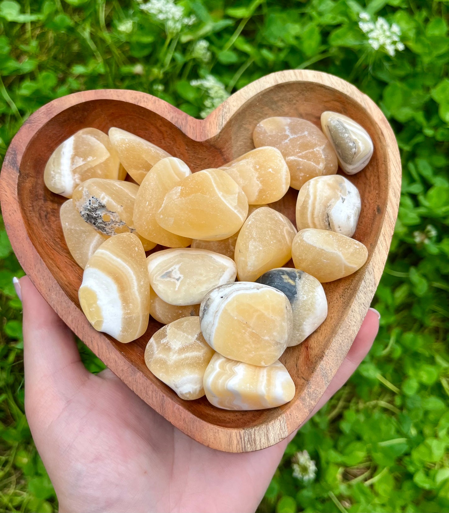 Orange calcite tumbles