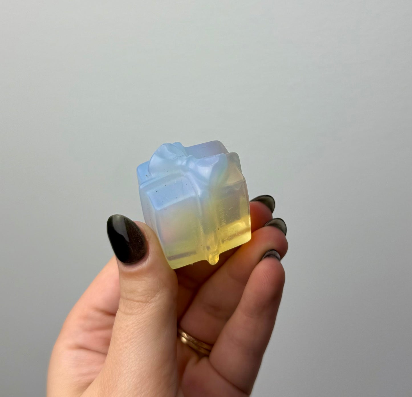 Man made material Opalite present carving