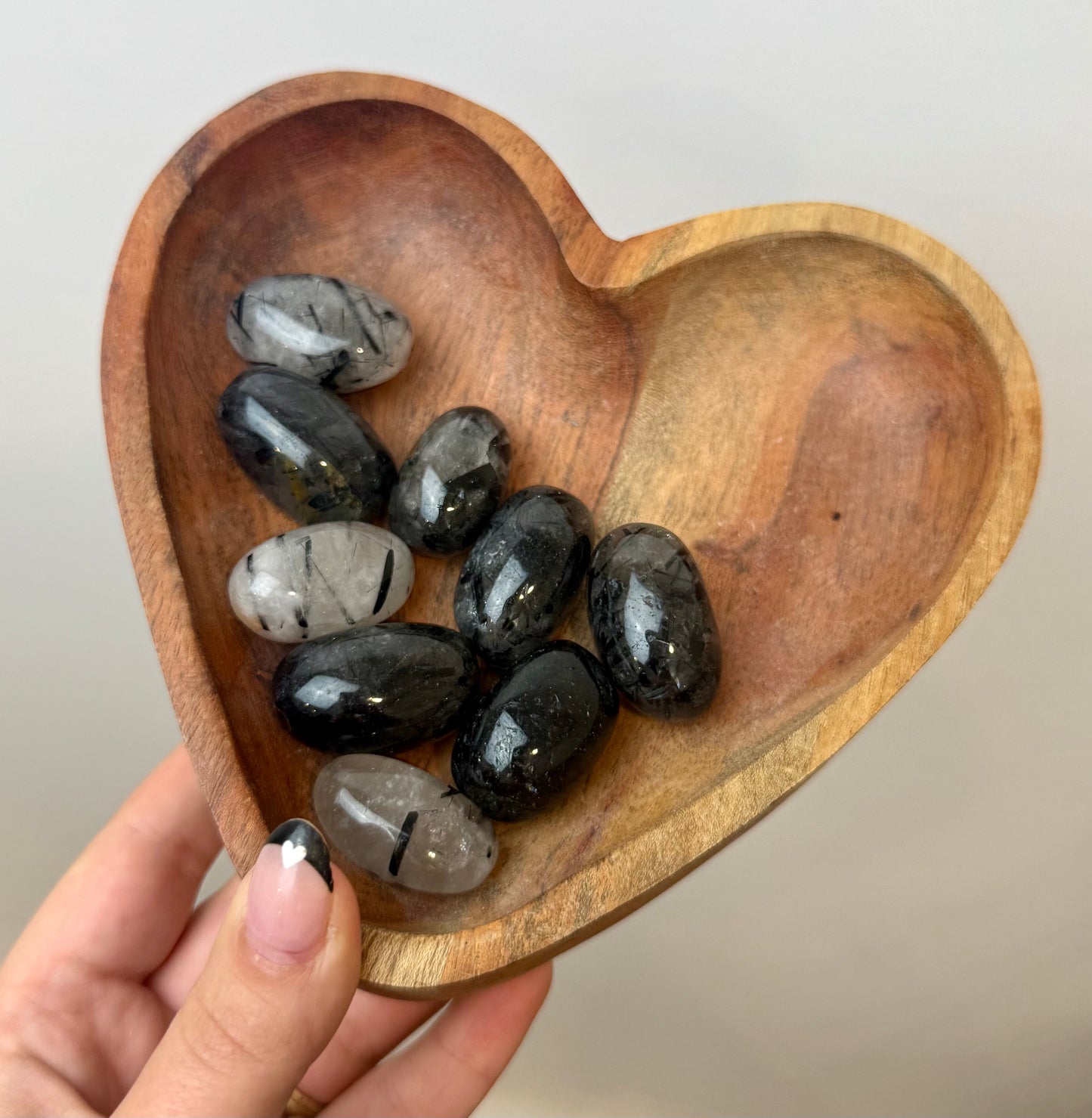 Black tourmaline in quartz tumbles