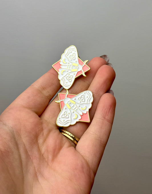 White moth enamel pins