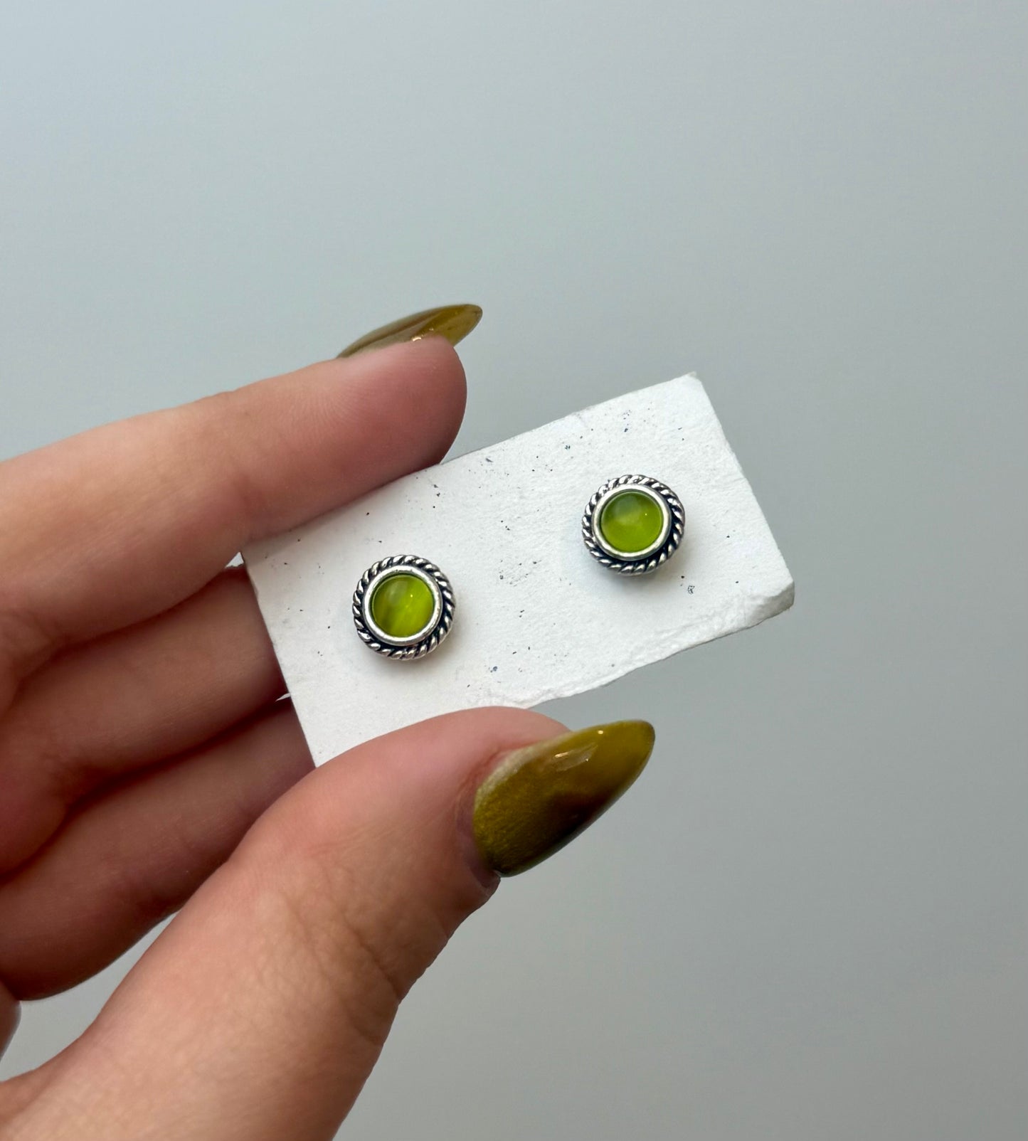 Green cats eye man made material earrings thrifted find