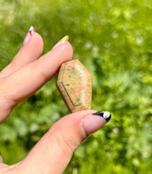 Unakite coffin carving