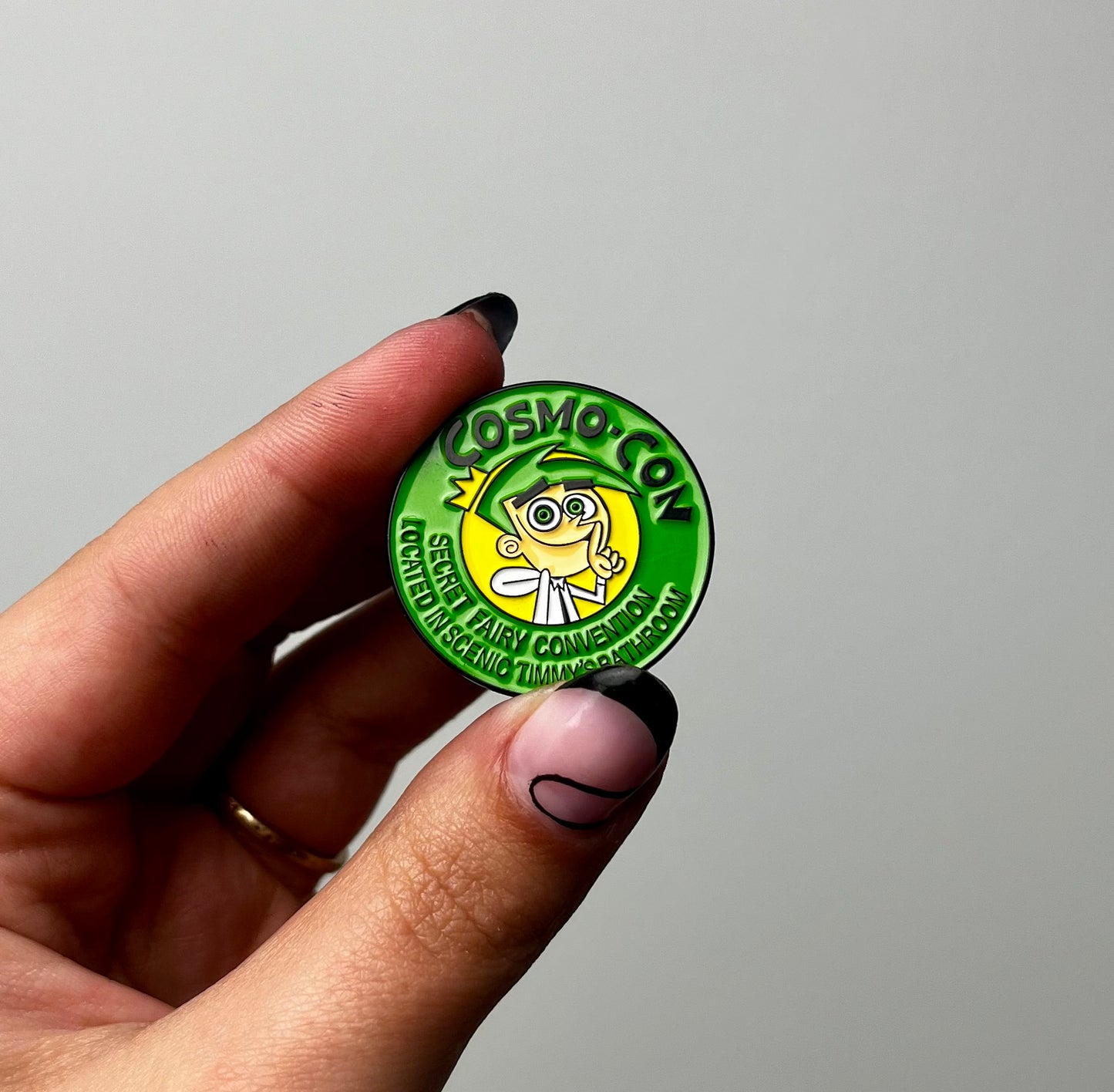 Cosmo enamel pin