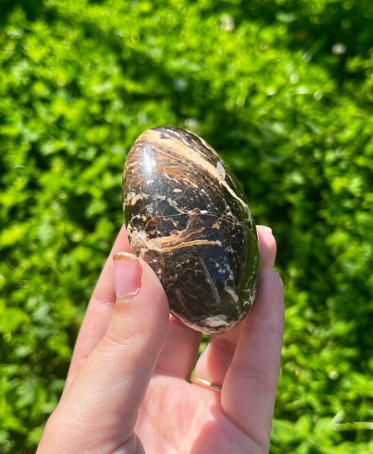 Chocolate opal palm stone