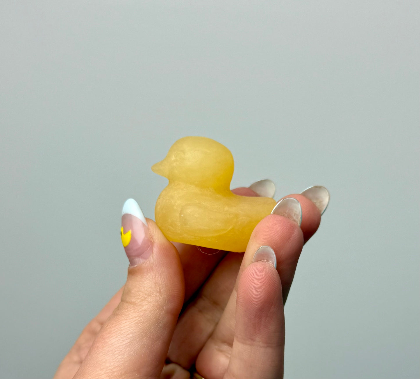 Orange calcite duck carvings