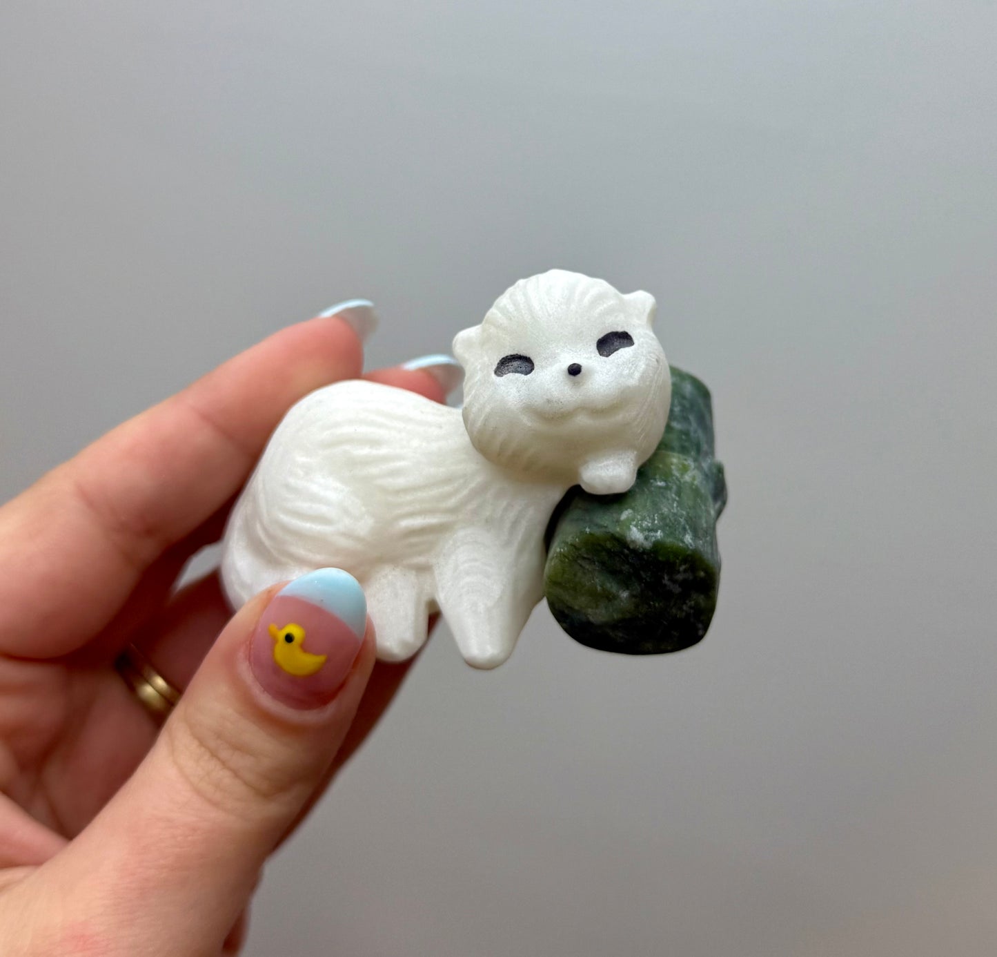 White jade otter carvings