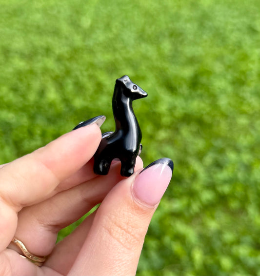 Obsidian giraffe carving