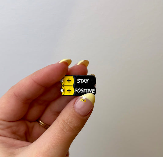 Stay positive enamel pin
