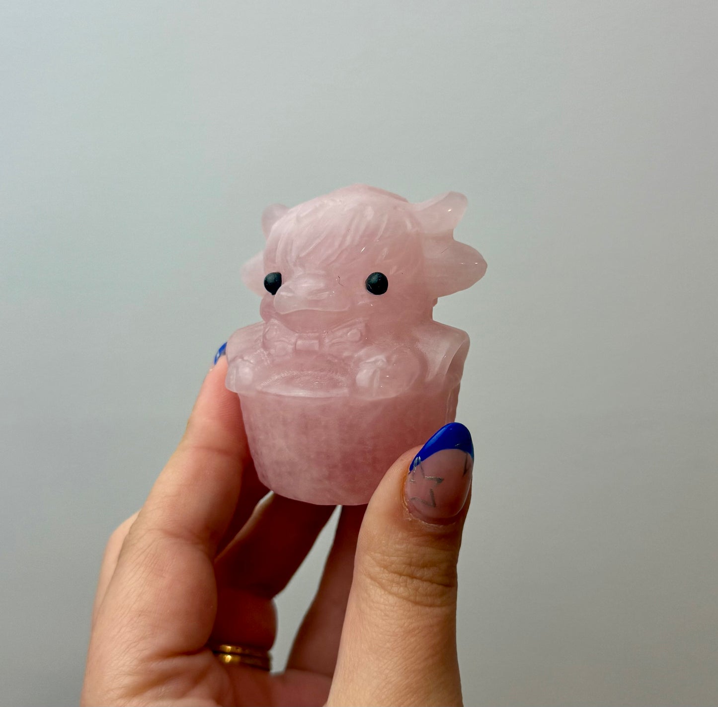 Rose quartz cow carving